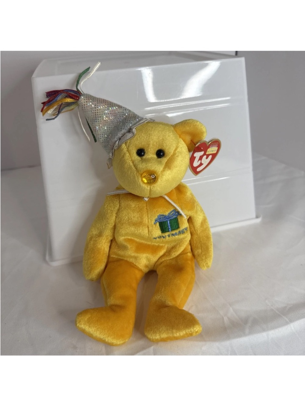 Ty Beanie Baby November Birthday Bear Yellow with Silver Party Hat. NWT rare